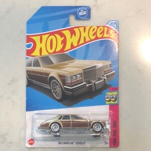 Mattel Hot Wheels '82 Cadillac Seville - Brown and Silver